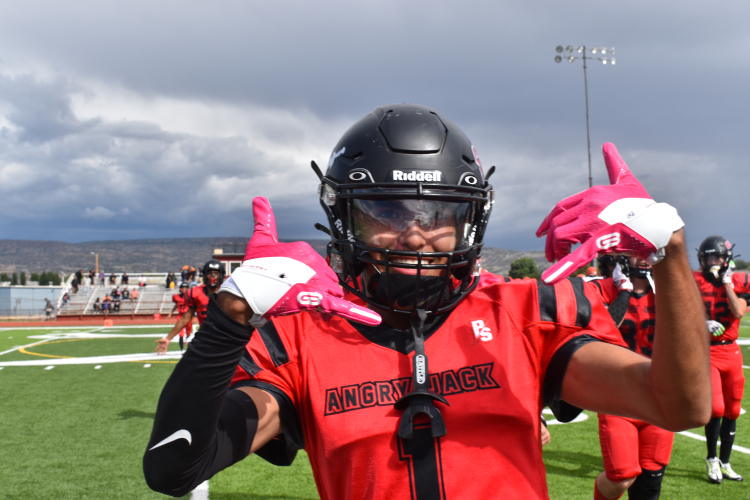 Grants' Knight Long celebrates, after his 99-yard kick return for a touchdown